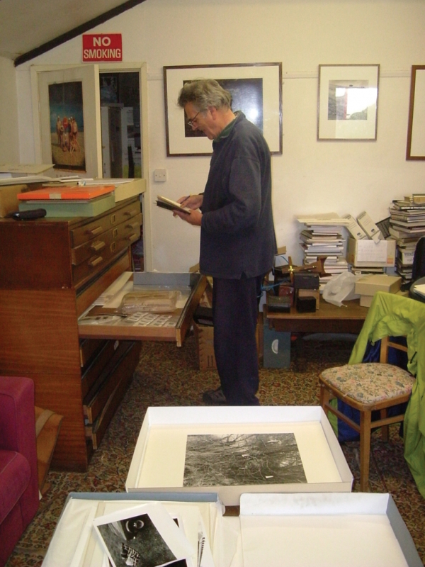 Paul Hill at the Photographer's Place sorting through the Archive prior to Birmingham Library finalising its acquisition in 2005 - Courtesy Pete James, Birmingham Library and Archive from Where Do All The Photographs Go? by Mark Bolland - Click for Next Image