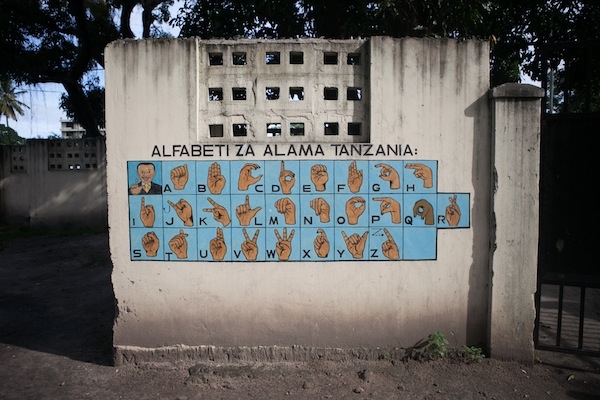 ‘Situated by the gates is a mural showing the alphabet in Swahili sign language’ - Hamish Roberts - Falmouth University
