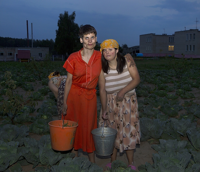 ‘Free Labour Minsk Region, Belarus 2016. Disabled women working in a field. Institutions are partly self-sufficient. Patients are forced to work in fields, clean and cook.’ - Jadwiga  Brontē  - London College of Communication