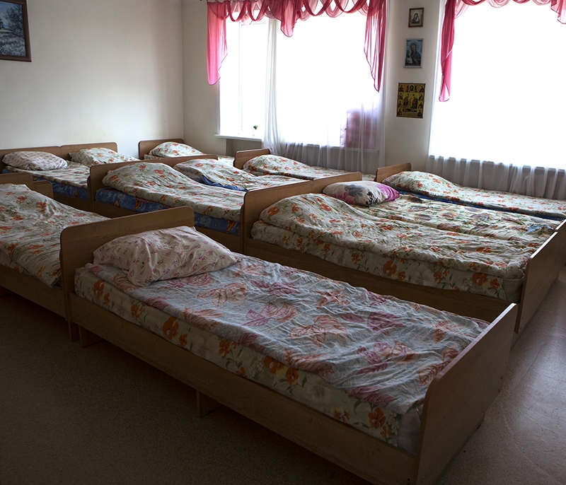 ‘Beds Gomel District, Belarus 2015. Room with multiple rows of beds. Couples have no privacy, residents are divided by sex and sleep in different rooms.’ - Jadwiga  Brontē  - London College of Communication