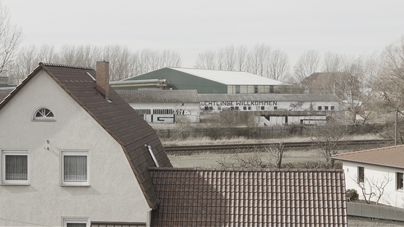 ‘Flüchtlinge Willkommen, (Refugees Welcome),Greifswald, (Birthplace of the Painter), BalticCoast, Germany, 2016, Moving Image’ - Tim Sullivan - Royal College of Art